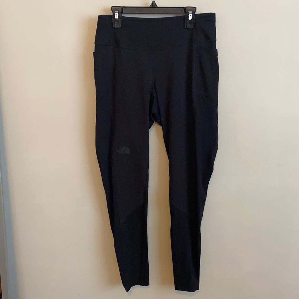 Mesh type material on front & back black leggings